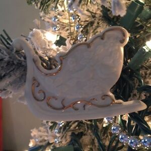 Elegant White and Gold Sleigh Ornament